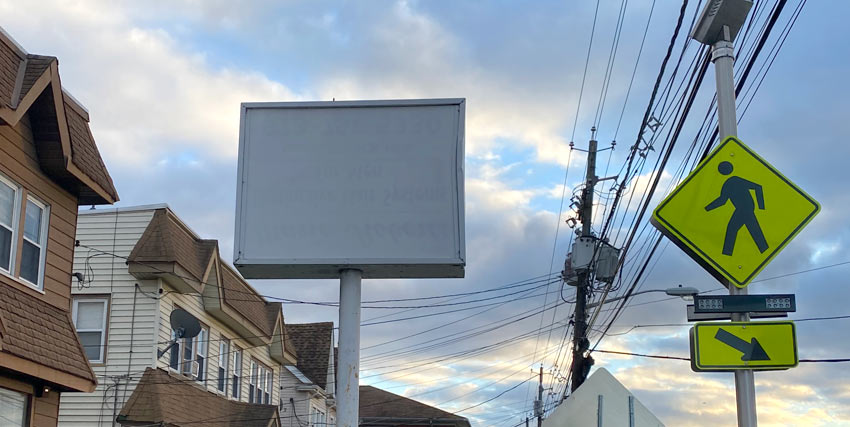 empty sign holder on a local street