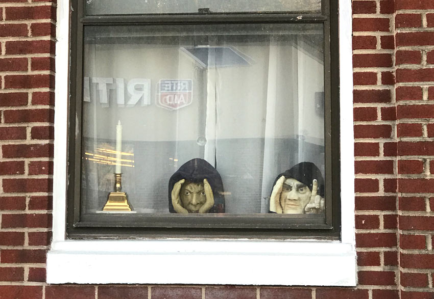 figures in the window at the Llewellyn Hotel in West Orange