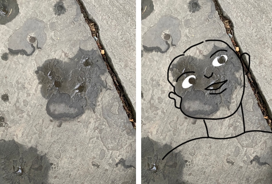 Wet spots on a slate sidewalk seem to suggest a face to me.