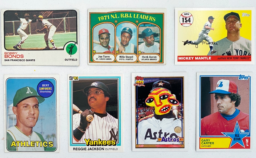 Baseball card collection with one Picasso face