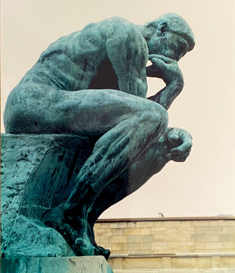 Auguste Rodin's "Thinker" sculpture, seen in Paris. Photo is © Mark McKinney.