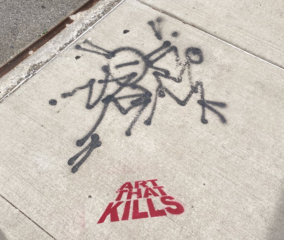 Art That Kills spray tag on sidewalk in NYC