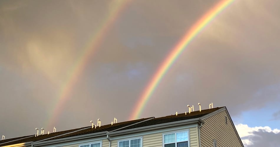 The color sequence of the inside rainbow is reversed in the outside rainbow.