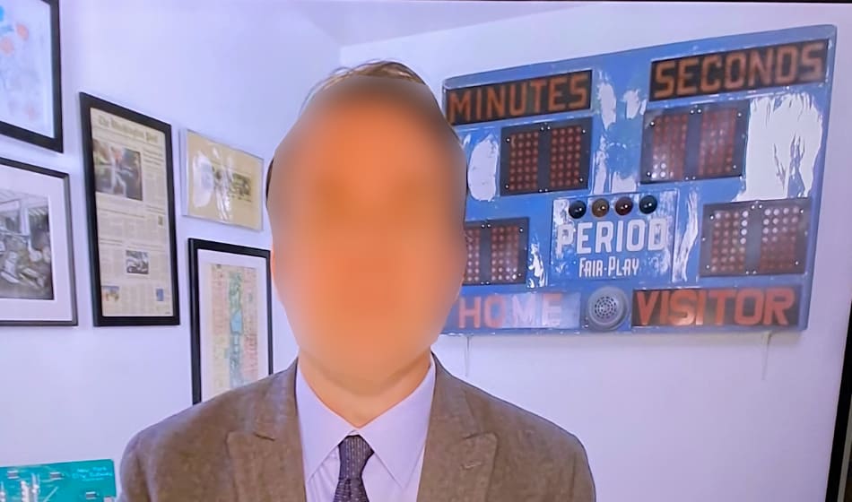 A vintage Fair Play scoreboard installed as art in the background for this tv interview.
