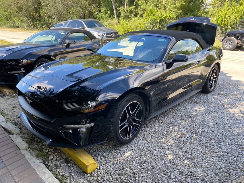 black Ford Mustang convertible