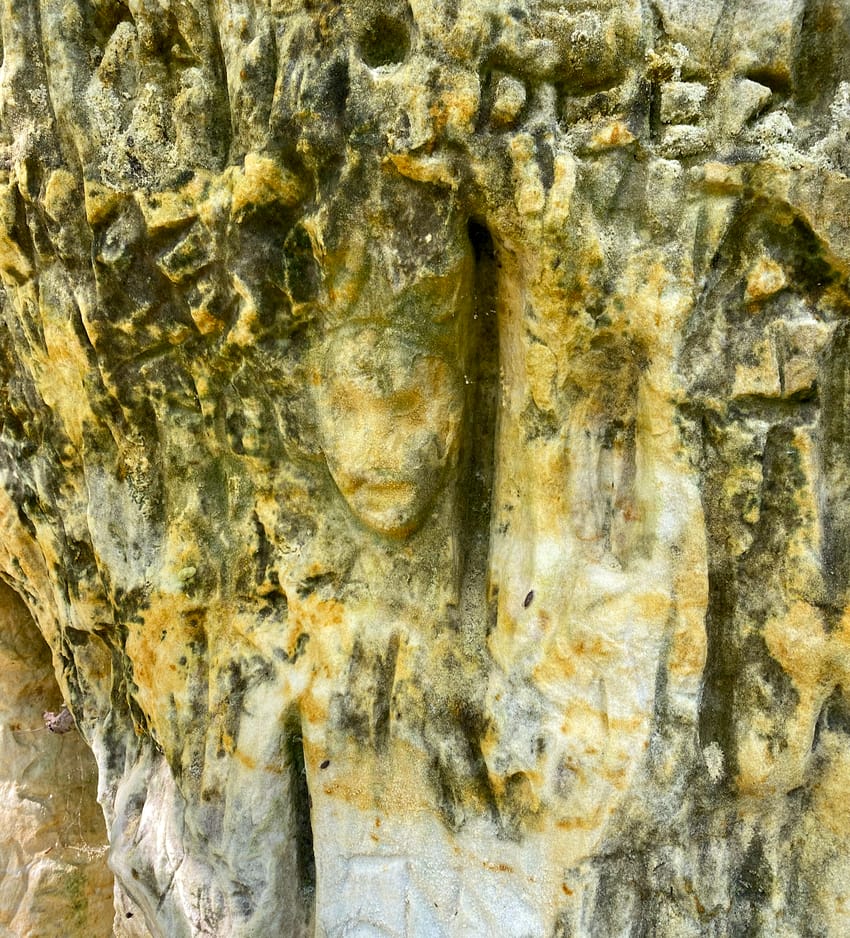 face carved in sandstone by Minnehaha Creek