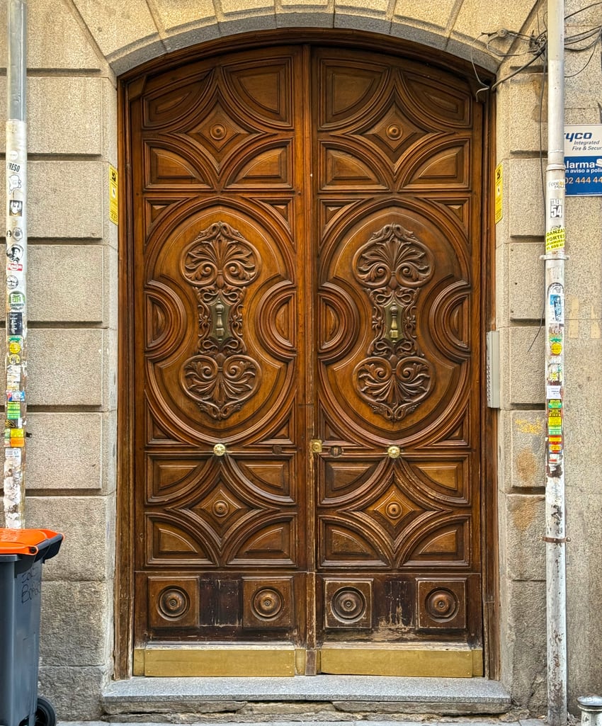 ornate wood door in Madrid