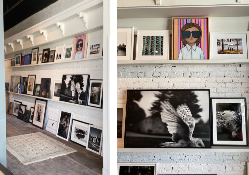 art work displayed on shelves