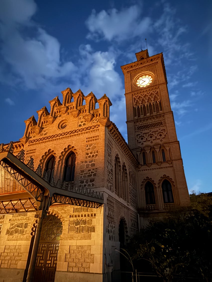 exterior view of the clock tower at the Toledo Railway Station in Spain