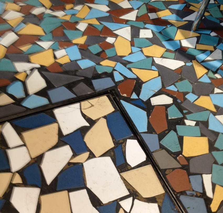 broken tile mosaic floor pattern in Paris