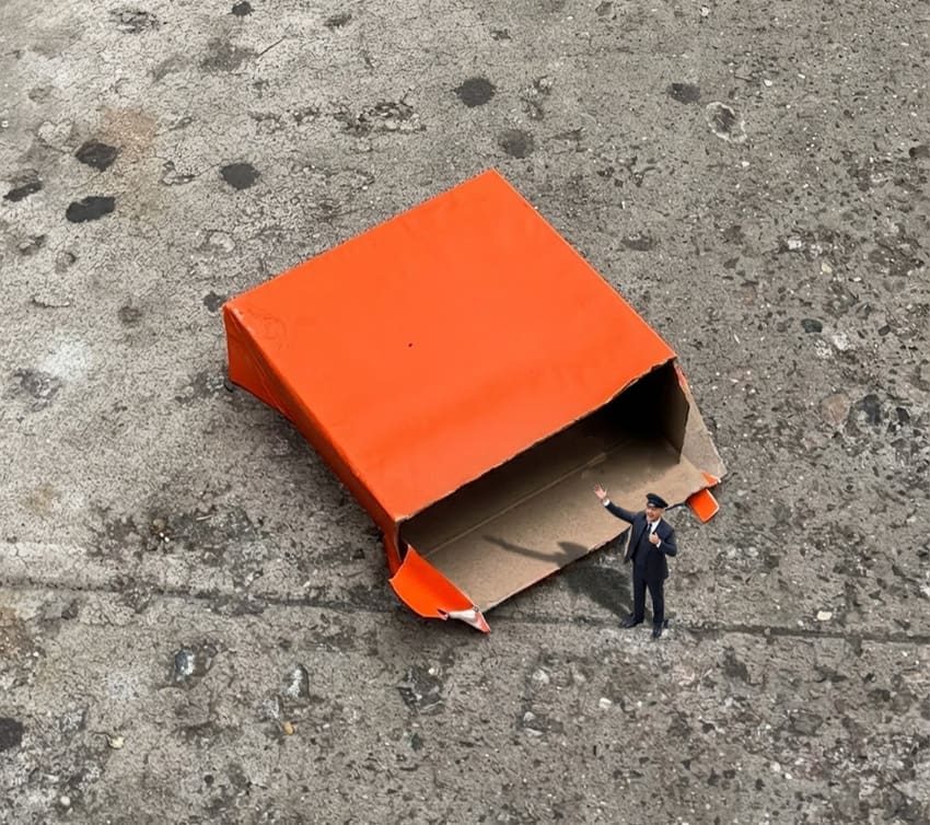 carnival barker invites us in