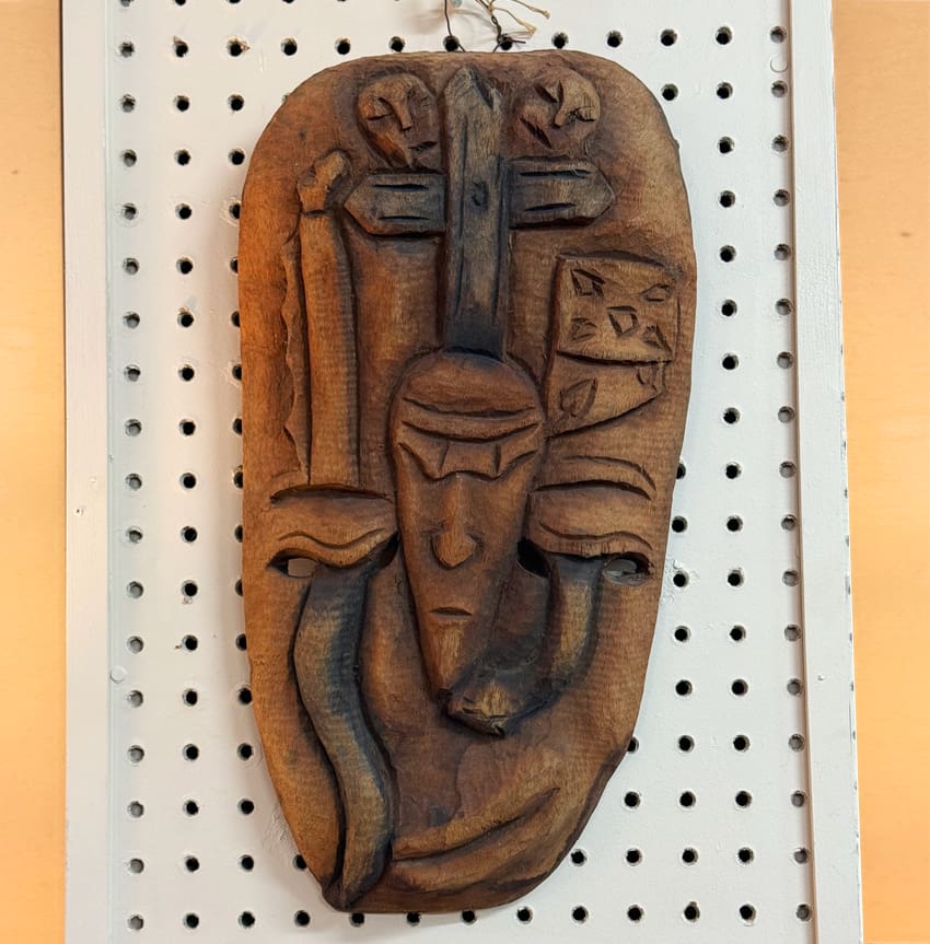 Carved wooden mask bought at an antiques store