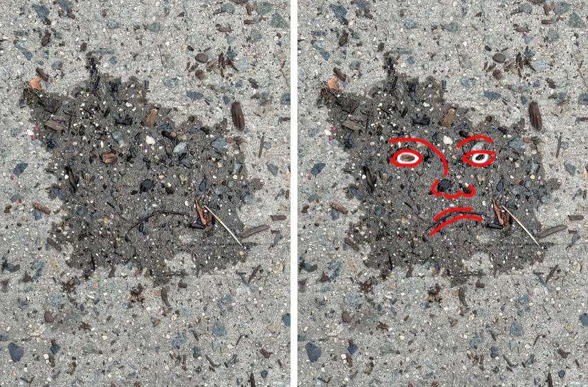 a wet spot on the sidewalk looks like a face, a case of pareidolia