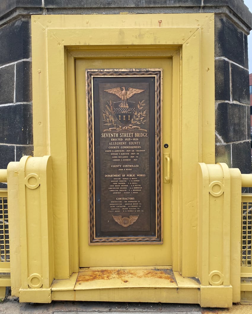 Dedication plaque on the Seventh Street Bridge in Pittsburgh.