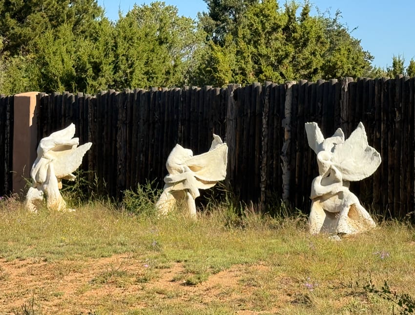 abstract sculpture in a Santa Fe front yard