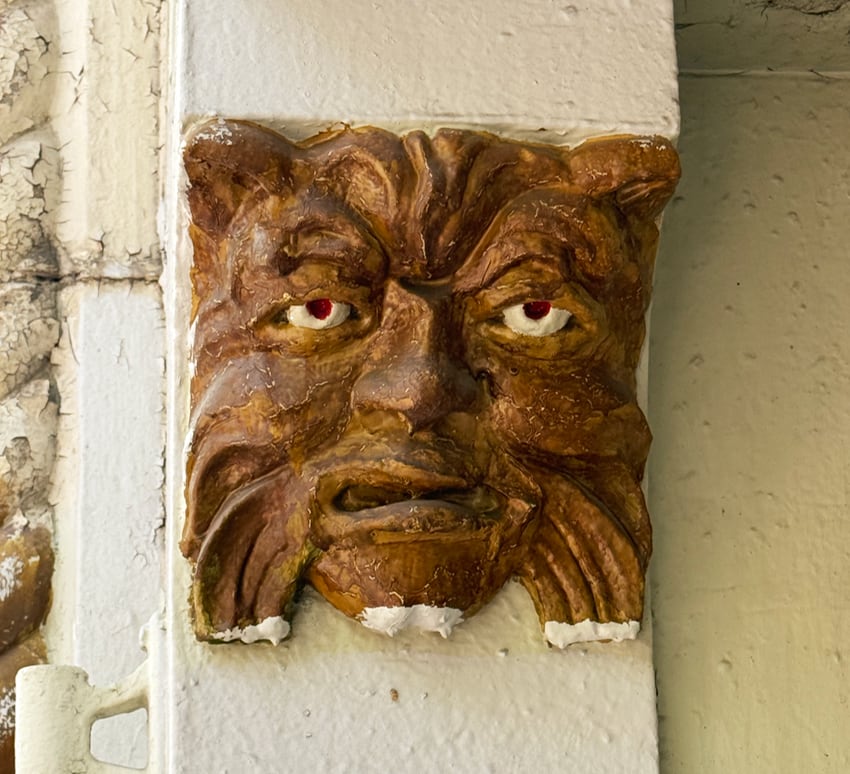 mascaron face on a building on the Upper West Side of NYC