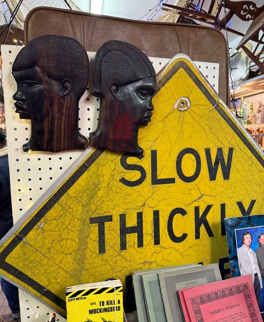 Slow Thickly Settled Road Sign at antiques store